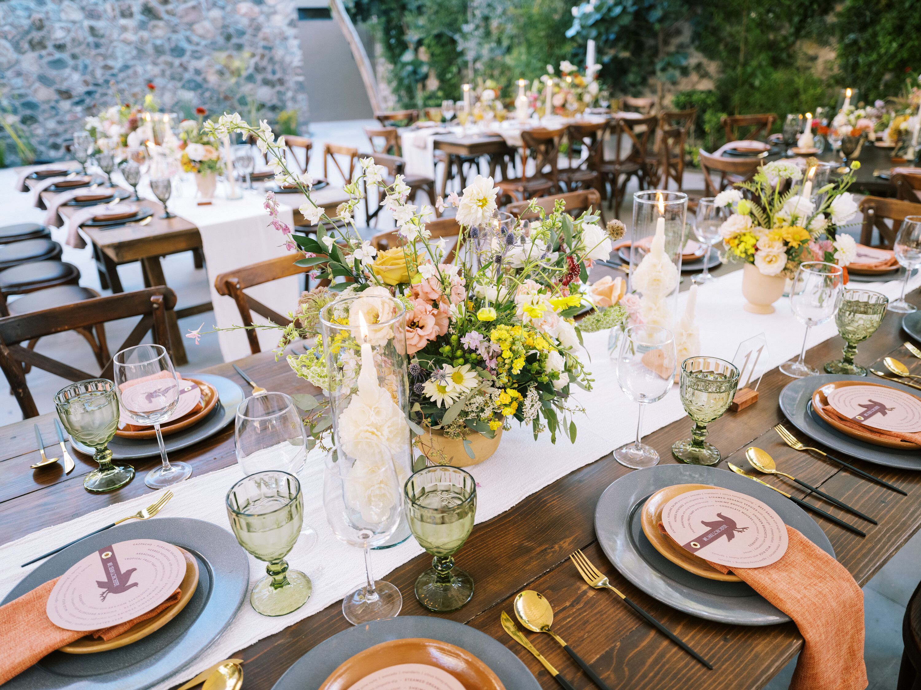 Wood Tables With White Linen Runners, Low Centerpieces, Colorful ...